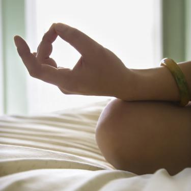 woman meditating.